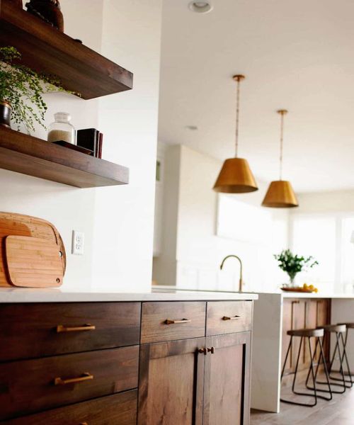 brown cabinets with white walls