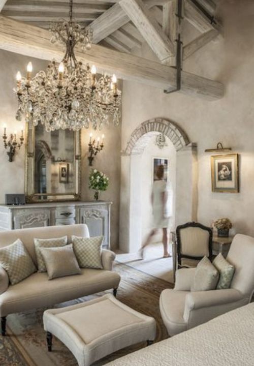 chandeliers-hanging from a vaulted ceiling