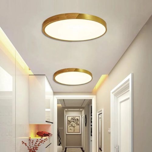 farmhouse hallway with metal rimmed lighting