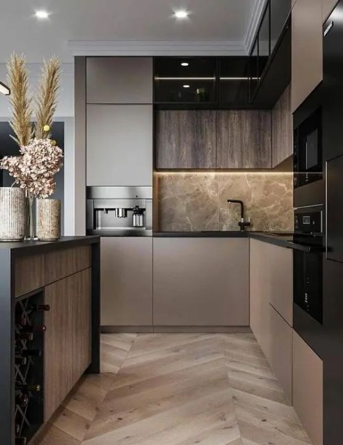 taupe kitchen with black appliances
