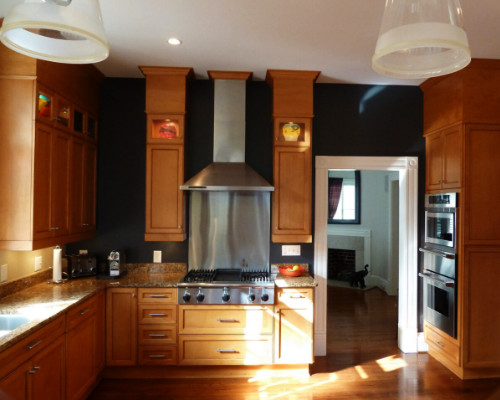 black with light wood cabinets