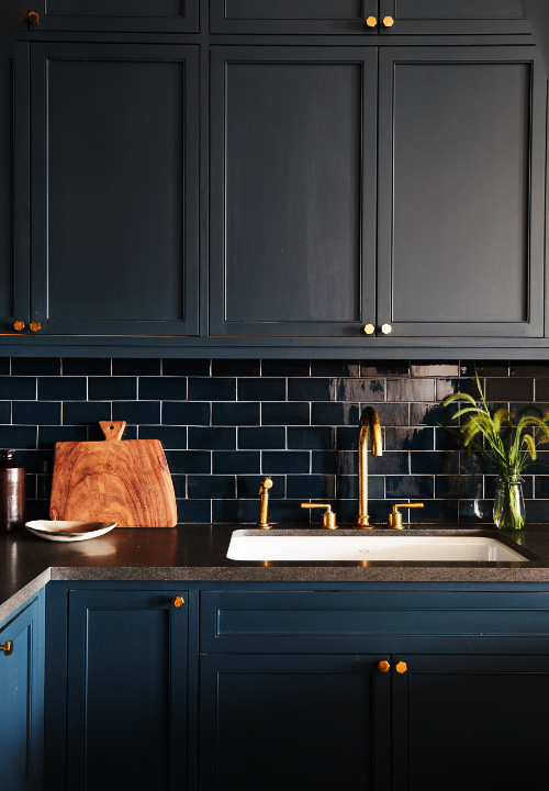 -gold cabinets and blue -tiles