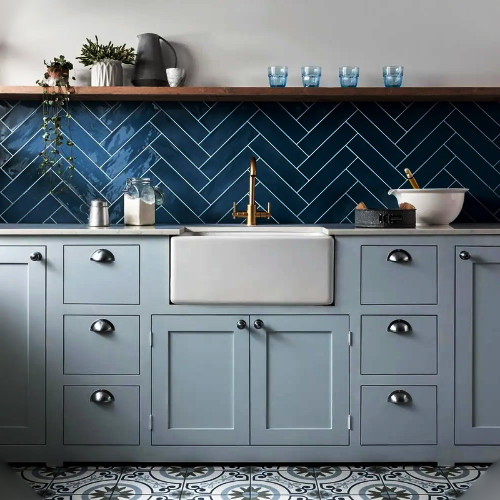 grey cabinets and blue tiles