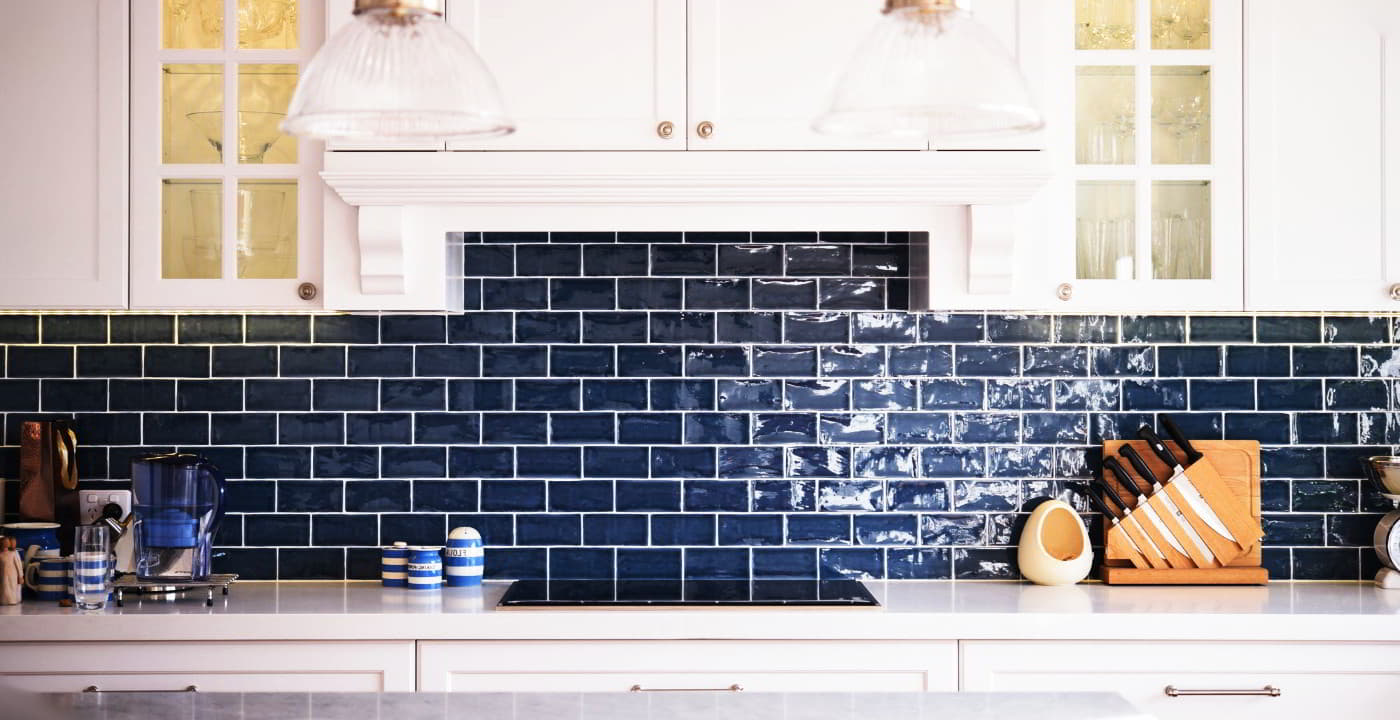 kitchen with navy blue tiles backsplash