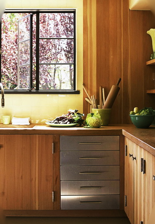yellow with light wood cabinets
