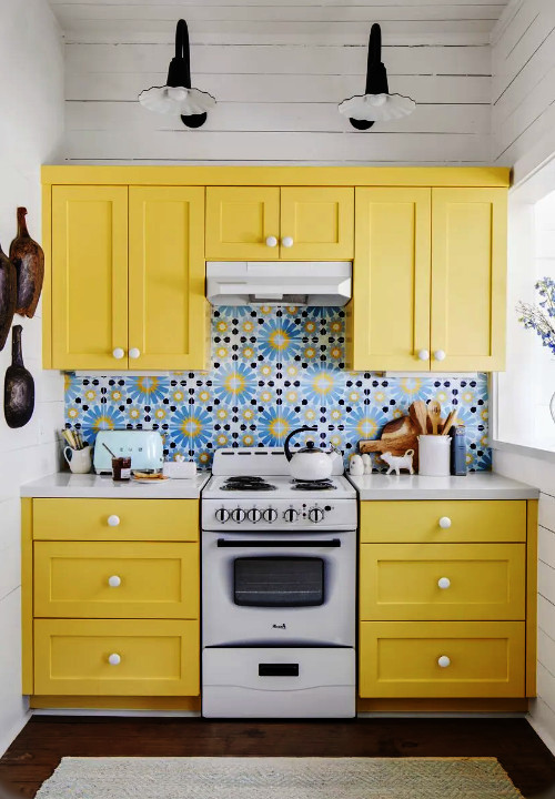 pastel- yellow kitchen color with white appliances