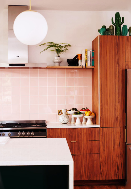 pink with light wood cabinets