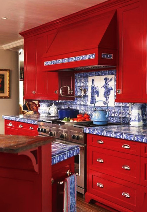 red cabinets with blue tiles